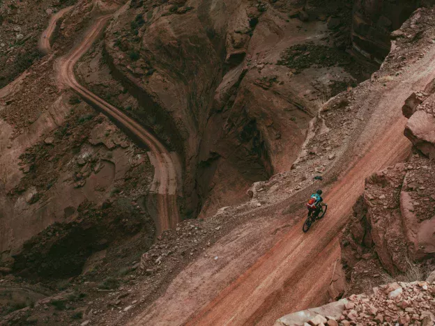 Mountain biker on rocky canyon trail